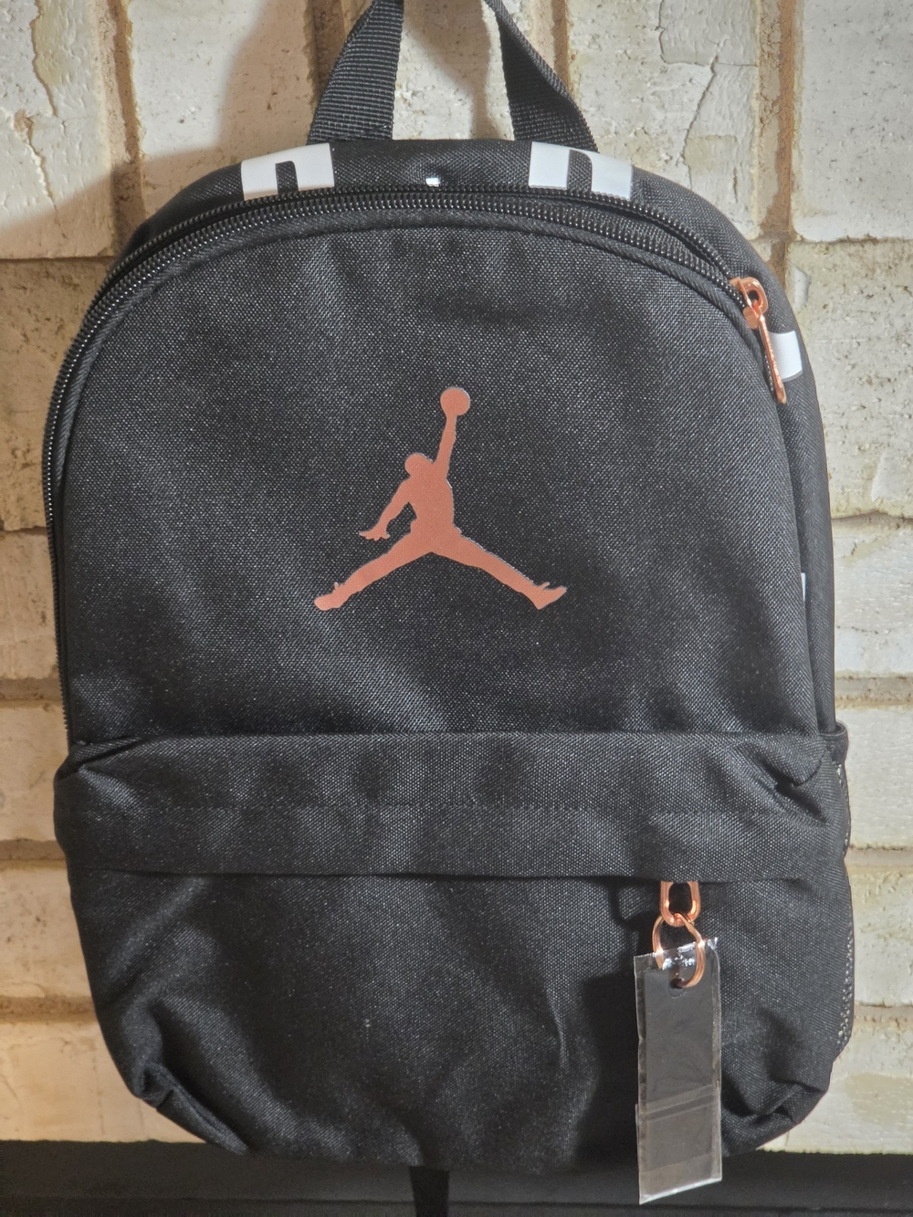 Brand New Nike Jordqn Black Mini Backpack with Copper Jumpman Accent